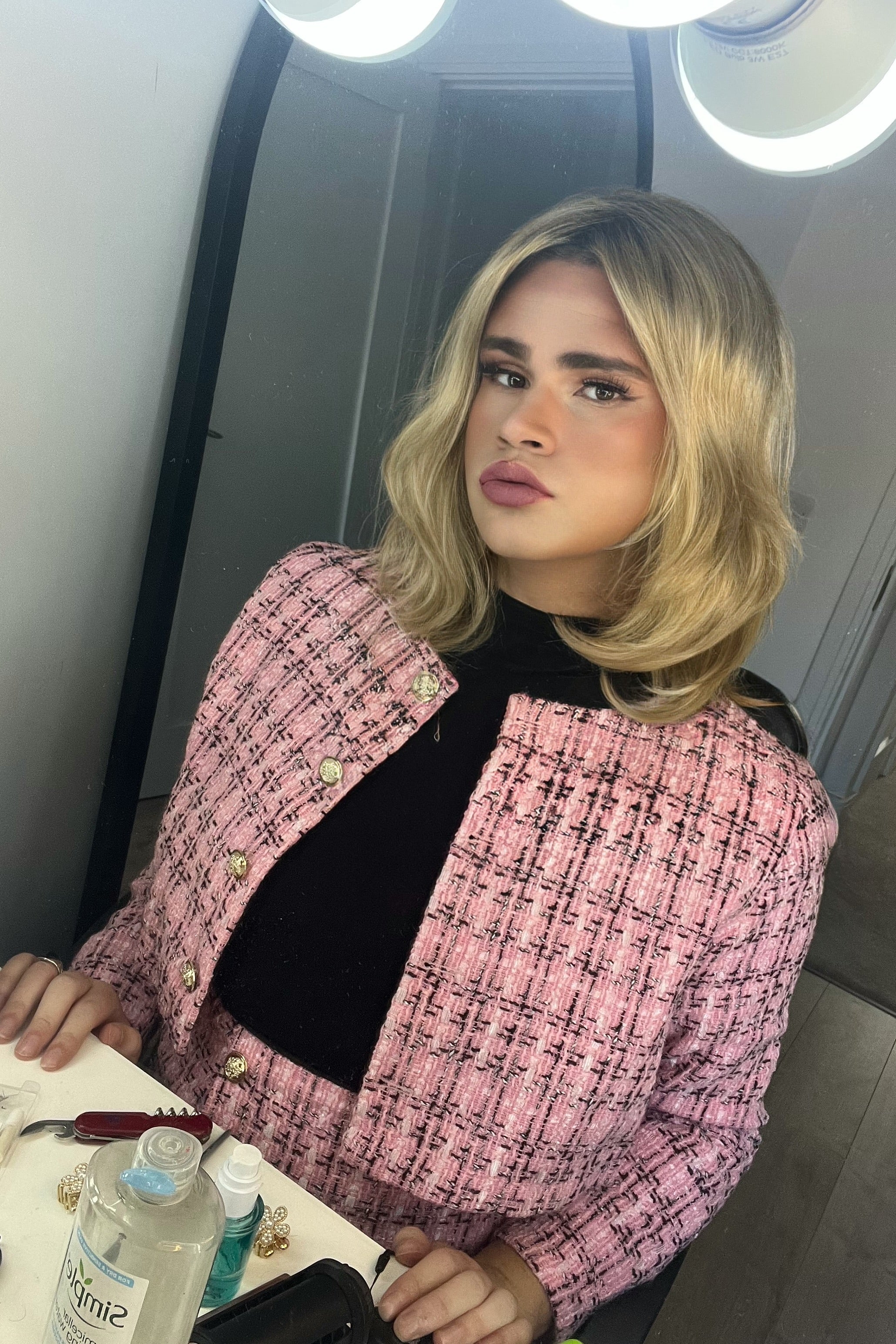 Alice is wearing a Henry Margu Bethany wig in the color 26GR